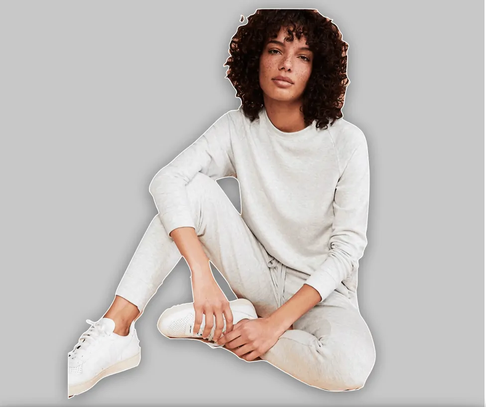 Woman wearing heather grey sweatsuit