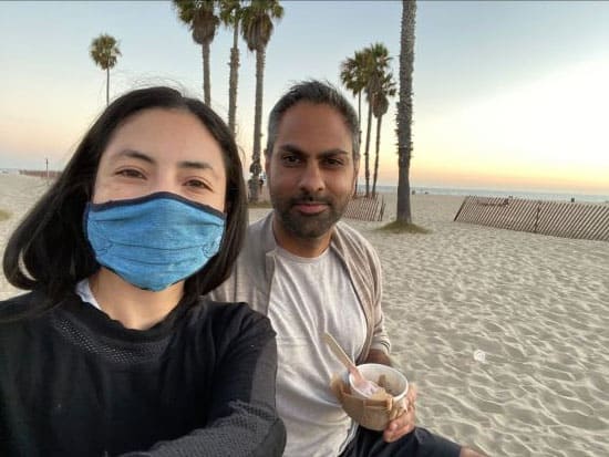 Cassandra Sethi Virtual Personal Stylist with Husband Ramit Sethi dressed in men's west coast clothing style at the beach