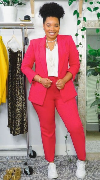 A Woman Wearing A Pink Suit And Sneakers In LA For A Business Casual Outfit