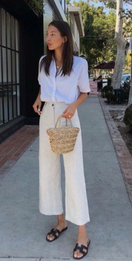 A Woman Wearing A Pair Of Black Strappy Elegant Sandals Displays West Coast Style When There Is No Dress Code