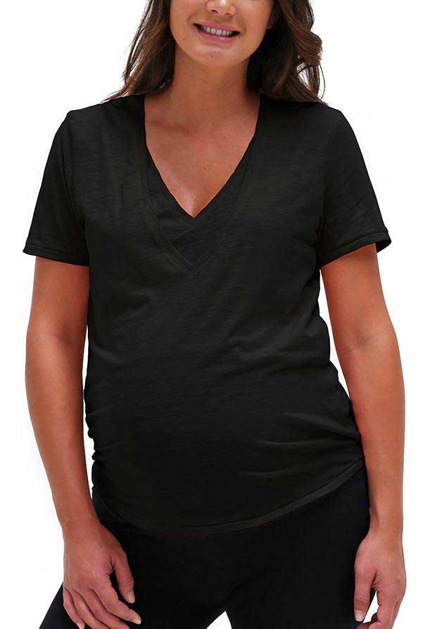 A Woman Wearing A Black V Neck Nursing Tee From Bun Maternity Which Is A Staple To Build A Post Pregnancy Wardrobe