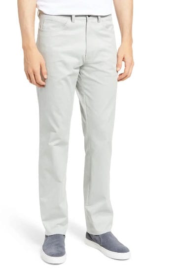 Man Modeling Next Level Wardrobe's Pick For Best Mens Dress Pants For Summer Charleston Flat Front Stretch Cotton Dress Pants By Berle