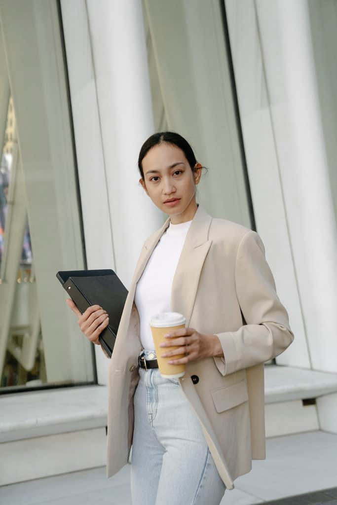 Los Angeles Woman Styled Business Casually In Jeans A White Top And Neutral Blazer