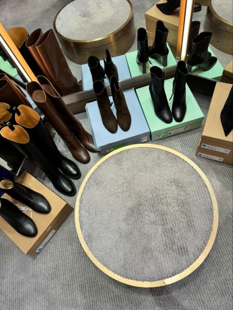 a display of shoes in a changing room.