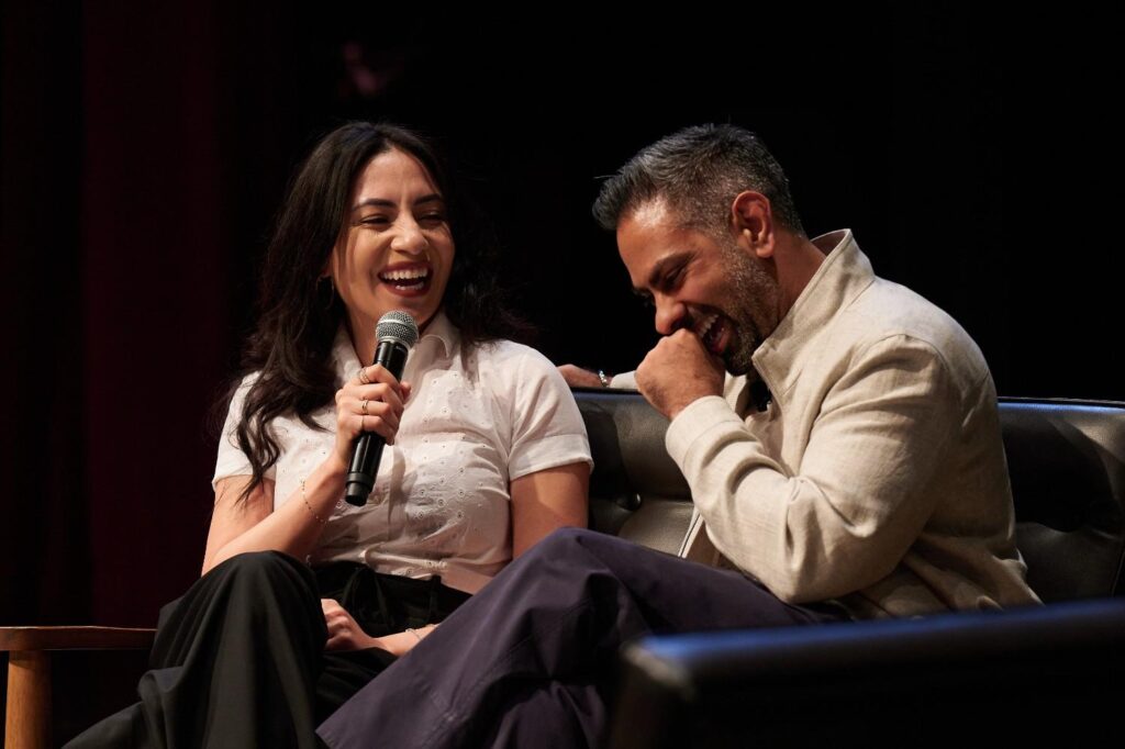 Ramit Sethi with his wife on stage in San Francisco.