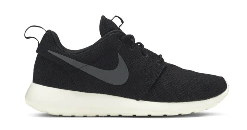 Black cloth Nike sneakers for executive style.