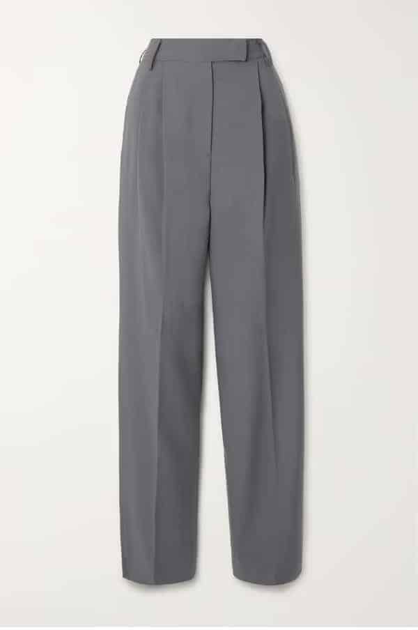 Dark gray pleated power business casual pants for office workwear.